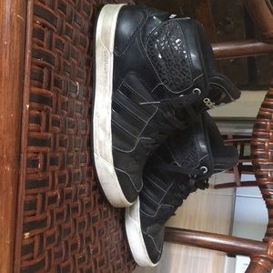 Women’s high top adidas black shoes. Gently used.